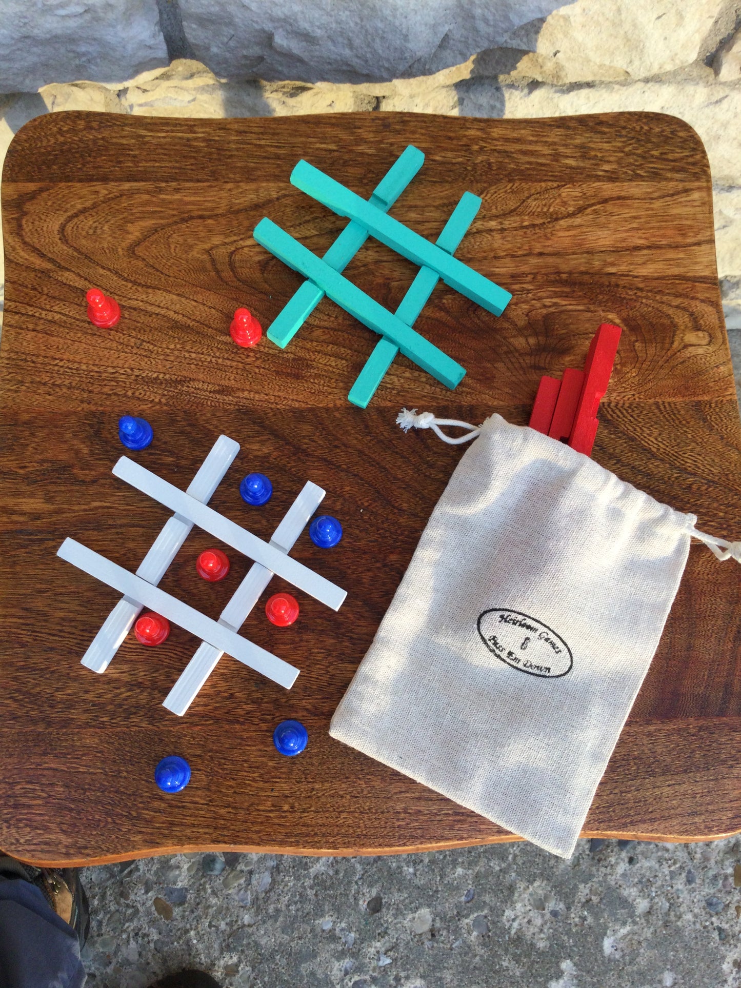 Travel Tic Tac Toe Painted wood with plastic pawns.Travel bag included.