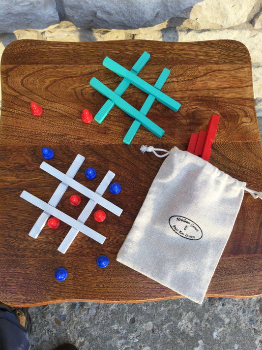 Travel Tic Tac Toe Painted wood with plastic pawns.Travel bag included.